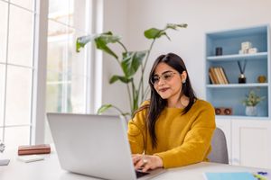 A young woman at a computer