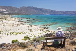A woman admiring the view in Crete, Greece